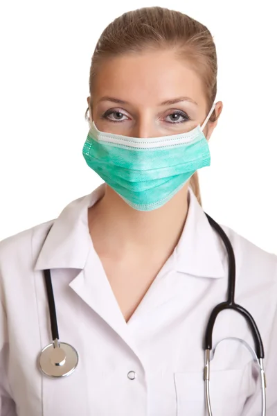Ärztin in Uniform mit Stethoskop isoliert auf weiß — Stockfoto
