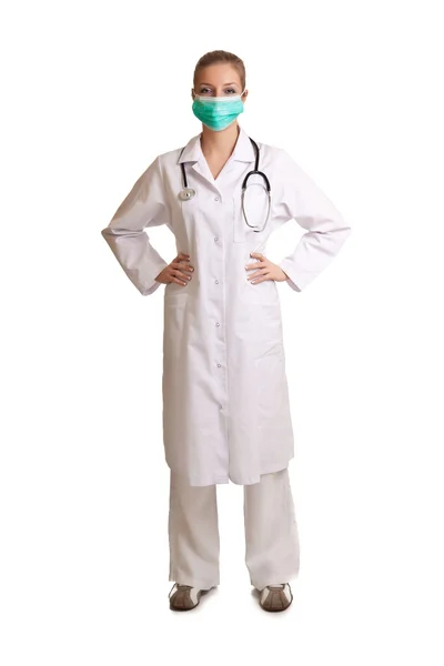 Medico donna in uniforme con stetoscopio isolato su bianco — Foto Stock