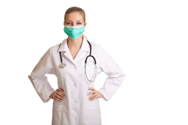 医師白で隔離される聴診器で制服を着た女性 — ストック写真