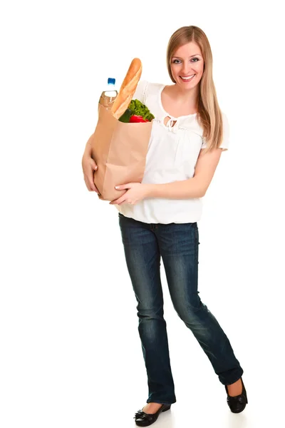 Женщина с пакетом продуктов, изолированных на белом — стоковое фото