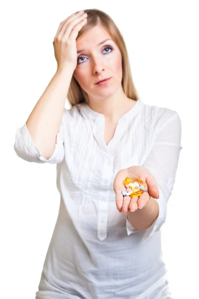 Woman holding pharmaceuticals on neutral bg — Stock Photo, Image