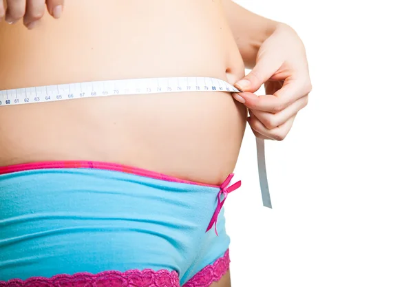 Donna incinta pancia con misura — Foto Stock