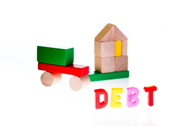 Koncepce dluhů a úvěrů od hračka bloky — Stock fotografie
