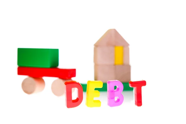 Pojęcie długów i kredytów od zabawki klocki — Zdjęcie stockowe