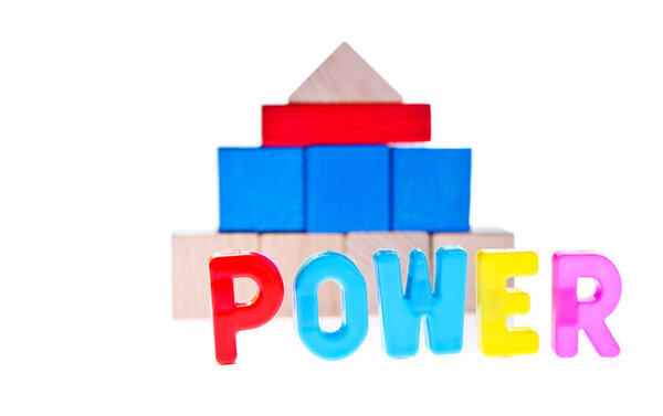 Power concept from wooden toy blocks