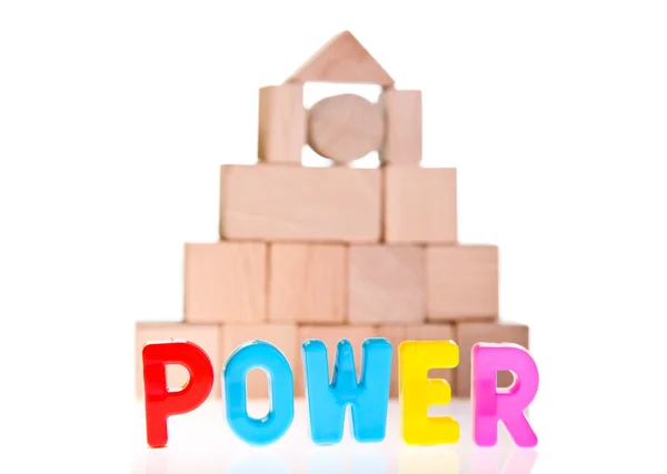 Power koncept från trä leksak block — Stockfoto