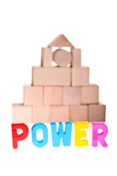 Power koncept från trä leksak block — Stockfoto