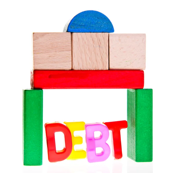 Концепция долга и кредита от игрушечных блоков — стоковое фото