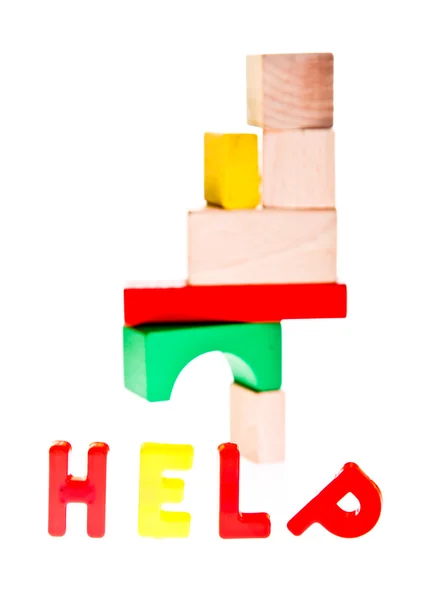Концепция помощи из игрушечных блоков — стоковое фото