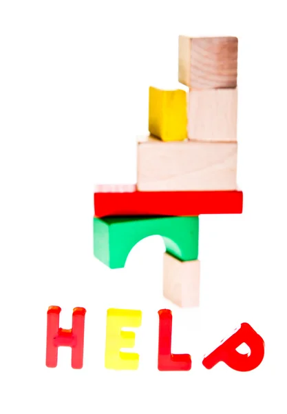 Concepto de ayuda de bloques de juguete — Foto de Stock