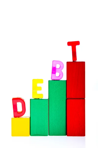 Begreppet skuld och kredit från leksak block — Stockfoto