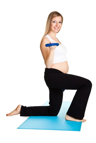 Mujer embarazada fitness aislado en blanco —  Fotos de Stock
