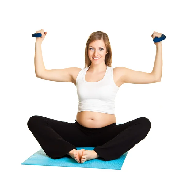 Mujer embarazada fitness aislado en blanco —  Fotos de Stock