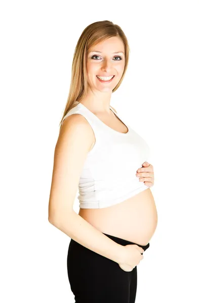 Hamile kadın fitness üzerinde beyaz izole — Stok fotoğraf