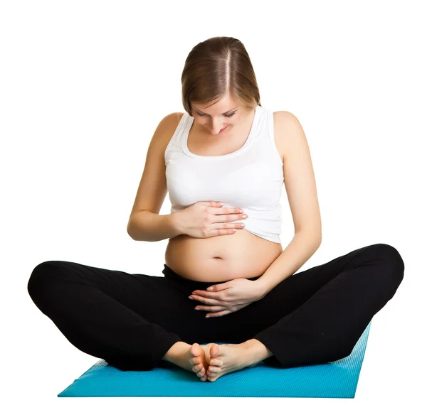Terhes nő fitness elszigetelt fehér — Stock Fotó