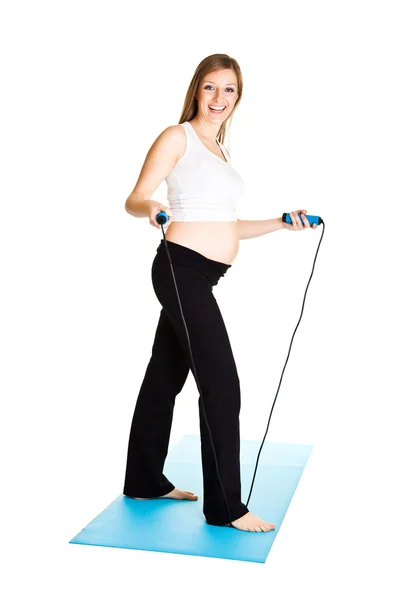 Zwangere vrouw fitness geïsoleerd op wit — Stockfoto
