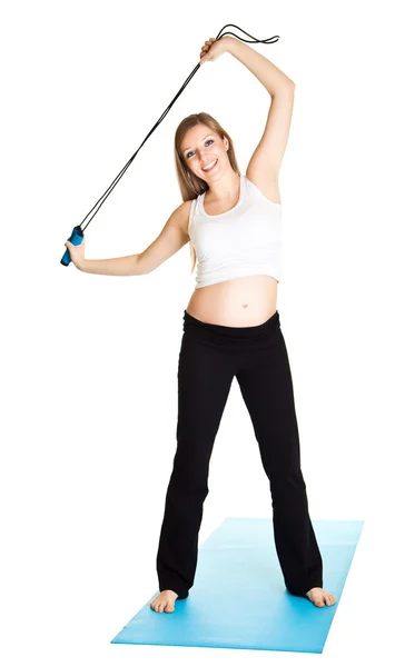 Donna incinta fitness isolato su bianco — Foto Stock