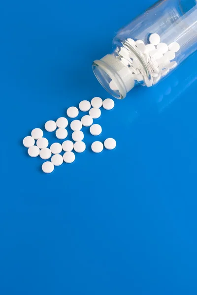 Pílulas em azul — Fotografia de Stock
