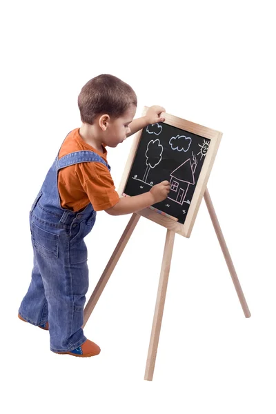 Мальчик рисует — стоковое фото