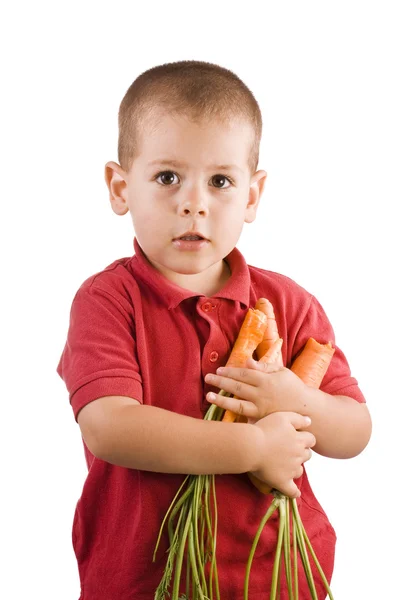 Boy and carrot — Stock Photo, Image