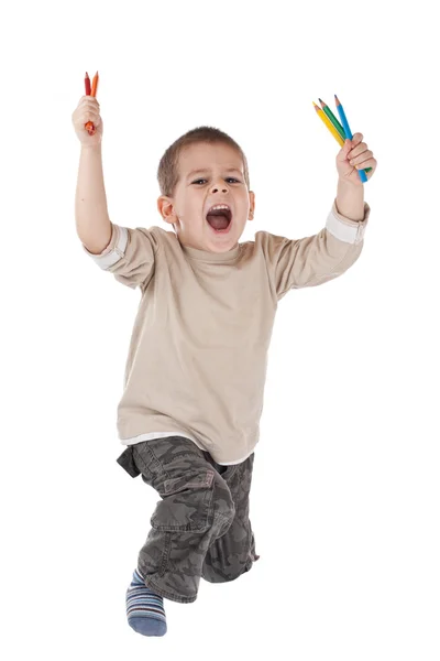 色の鉛筆と幸せな少年 — ストック写真