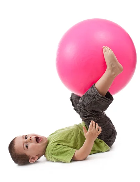 Little boy doing gymnastic exercises Stock Image