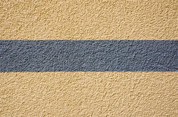 Yellow plaster with a grey stripe — Stock Photo, Image