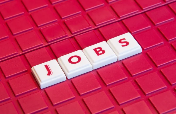 stock image The word Jobs written in small plastic letters