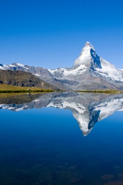 The famous Matterhorn reflected in the Stelisee clipart