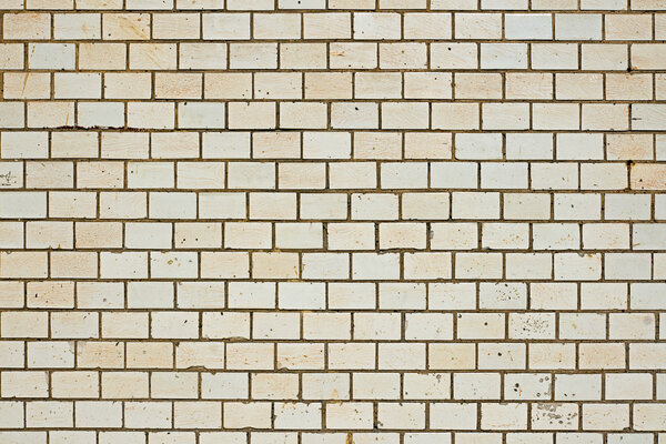 Background of a few rows of beige tiles