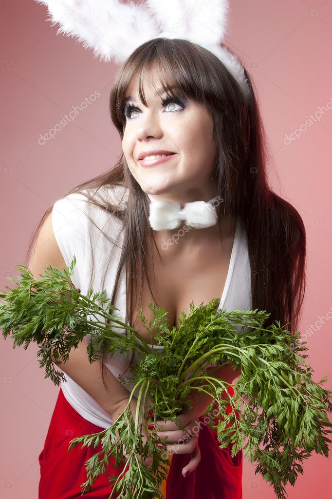 Bunny girl with carrot halm — Stock Photo © solosana #5184587