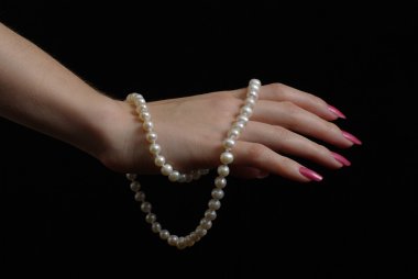 Hand with pearl beads clipart