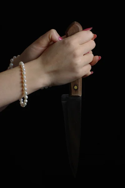 Hands holding a knife — Stock Photo, Image