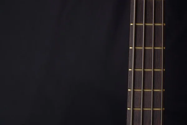 Pescoço Uma Guitarra Baixo Fundo Preto — Fotografia de Stock
