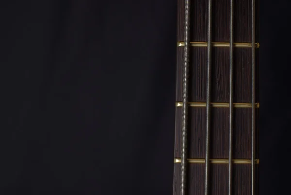 Neck of a bass guitar — Stock Photo, Image