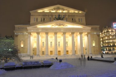 The famous Bolshoi Theater in Moscow during the night in festive lighting. clipart