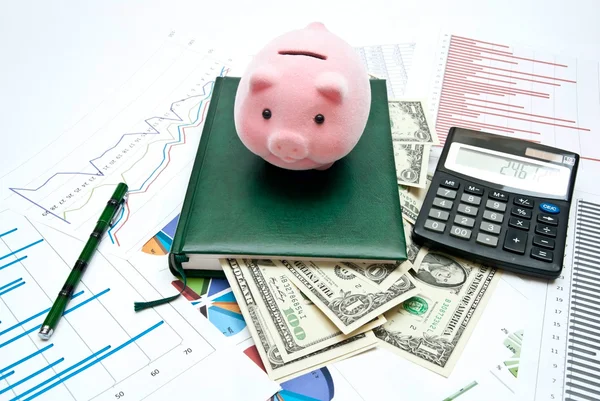 Piggy bank on office table — Stock Photo, Image
