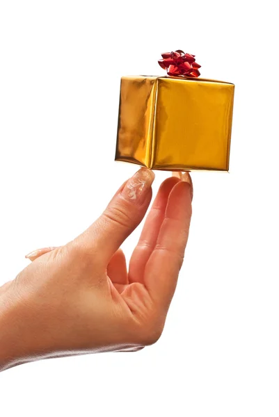 Mano femenina sosteniendo caja de regalo —  Fotos de Stock