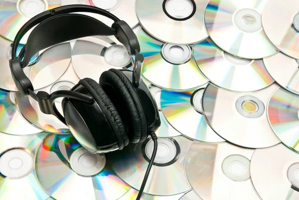 Tło CD ze słuchawkami — Zdjęcie stockowe