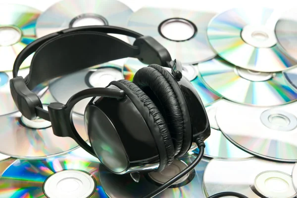 DVD background and headphones — Stock Photo, Image