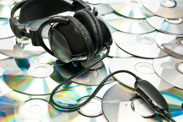 Headphones on cds — Stock Photo, Image