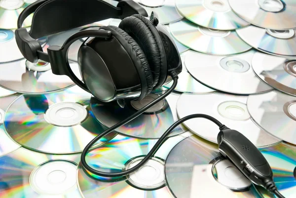 stock image Headphones on cds