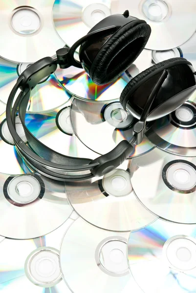 DVD background and headphones — Stock Photo, Image