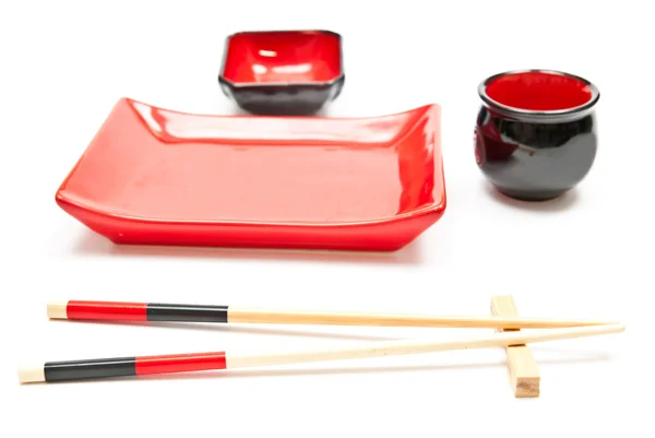 Chopsticks e pratos — Fotografia de Stock