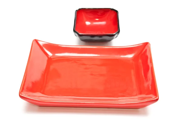 Red and black plates — Stock Photo, Image