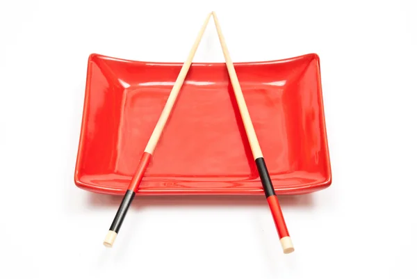 Chopsticks and plate — Stock Photo, Image