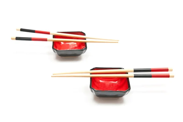 Chopsticks and plates — Stock Photo, Image