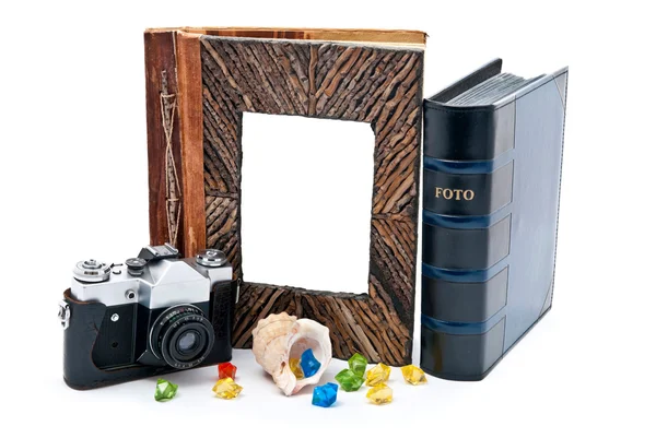 Photo album and camera — Stock Photo, Image