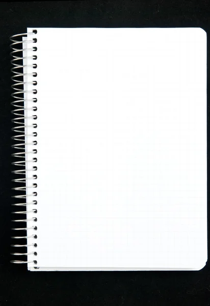 Página do bloco de notas isolado em preto — Fotografia de Stock