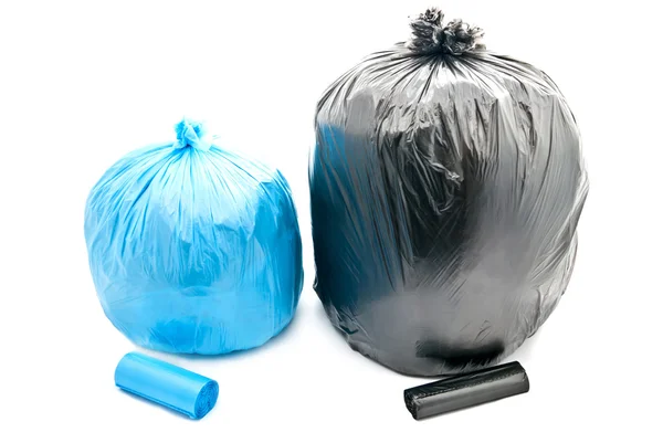 Gebundene Schwarze Und Blaue Müllsäcke Isoliert Auf Weißem Hintergrund — Stockfoto